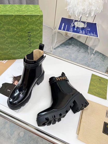 GG ankle boots black patent leather gold buckle