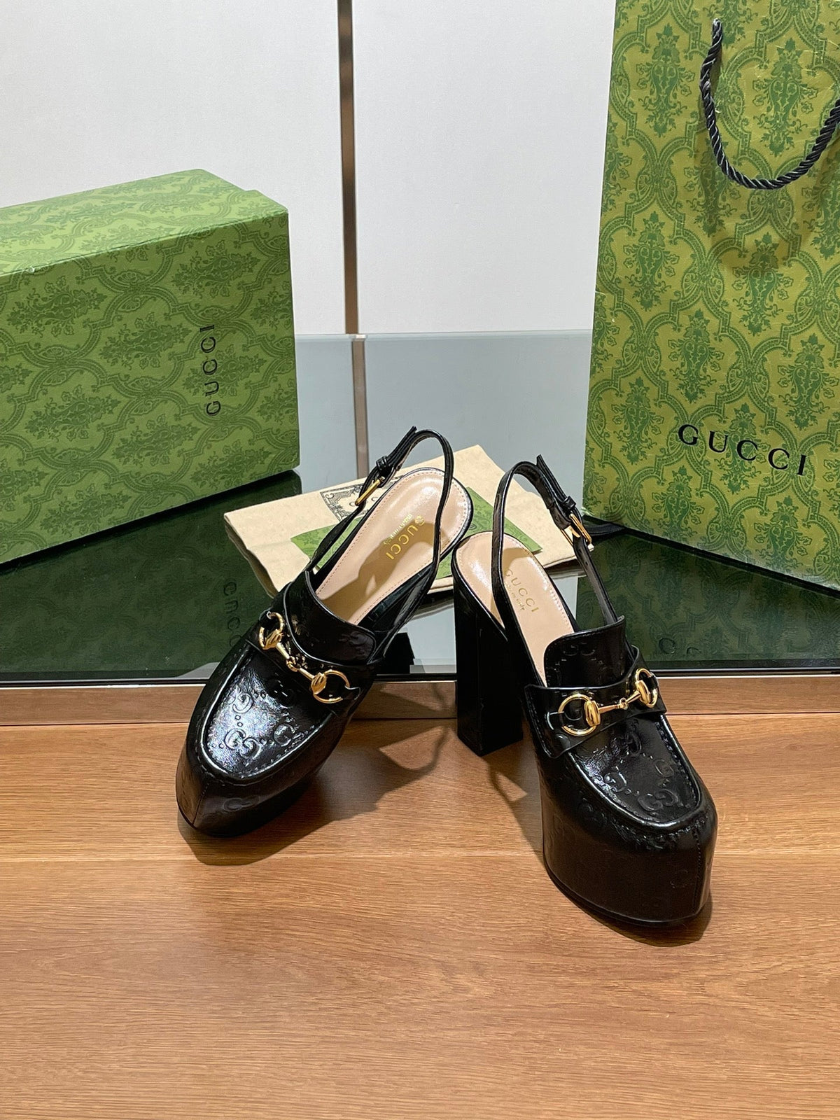 GG WOMEN'S HORSEBIT PLATFORM SLINGBACK IN BLACK EMBOSSED CALFSKIN