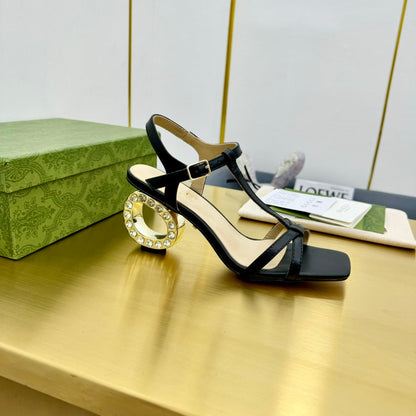 MEDIUM-HEEL SANDAL IN BLACK CALFSKIN WITH RHINSTONES